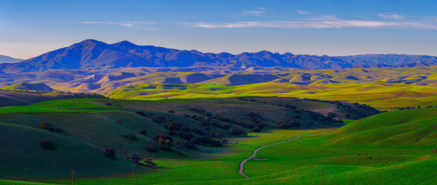 Southern Monterey County rolling hills outside King City.   Late afternoon pastel colors.