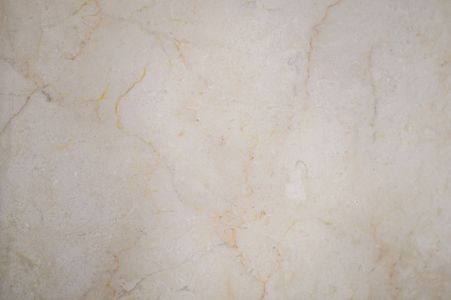 Close-up shot of Cream marble textured flooring