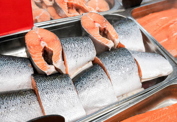 istock Steaks of fresh salmon fish on the counter 2108581151
