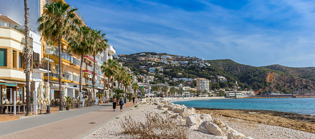 Panorama of the seaside boulevard with bars and restaurants in Javea, Spain