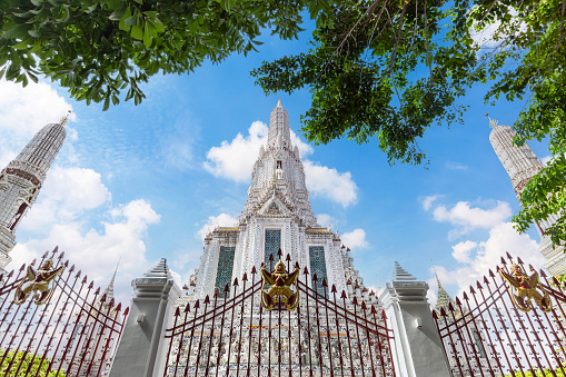 Wat Arun stupa or Wat Arun Ratchawararam Ratchawaramahawihan or The Temple of Dawn is the beautiful ancient architecture Landmark of Bangkok at side of Chao Phraya River, Bangkok, Thailand