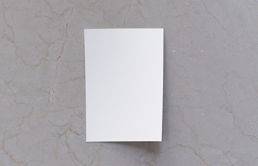 Blank paper mockup isolated on marble ceramic background