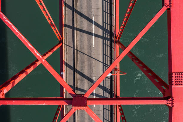 istock Drone photo: Red truss bridge and sunny winter nature 2108750390