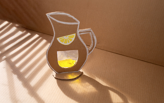 easy summer craft from recycled paper, lemonade pitcher in sunlight, summer themes, DIY, tutorial, art project for kids