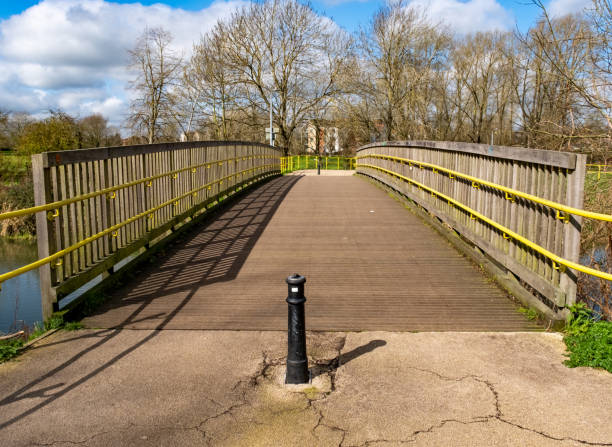 istock Wooden bridge over the river 2108870135