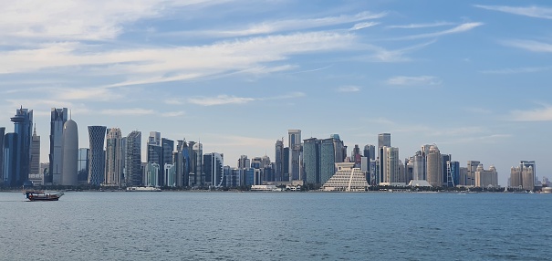 Beautiful urbanscape or city skyline of Doha with clear blue sky