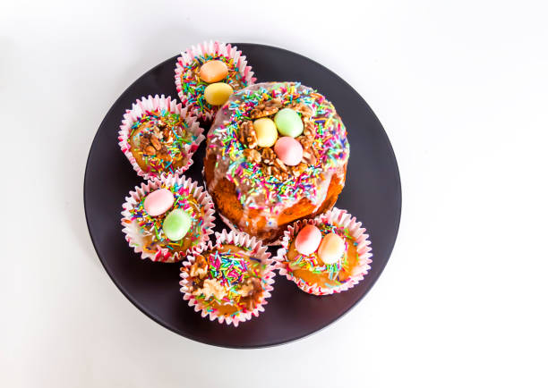 Traditional Easter pastry decorated with colorful sprinkles and sweet colorful eggs.