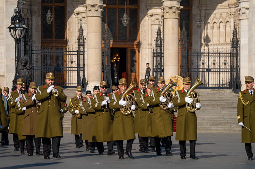 The change of the royal guard are marked by the guard under music march through the city of Copenhagen
