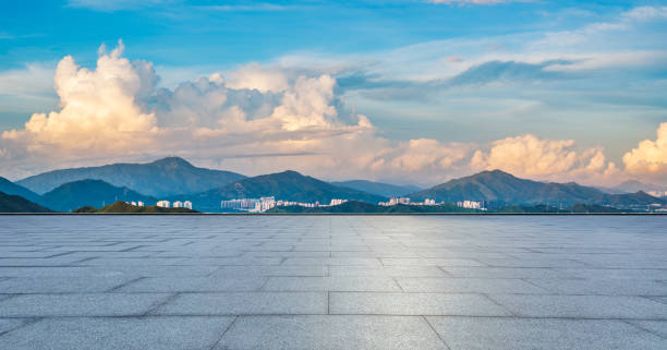 istock Empty square floor and green mountain with beautiful sky clouds nature landscape at sunrise 2108939648