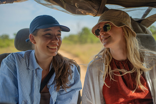 Portrait of friends on safari in 4x4, Yala National Park