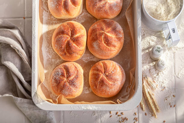 istock Tasty and homemade kaiser buns in rustic bakehouse. 2108970797