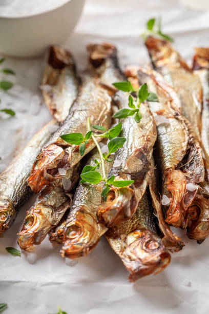 istock Healthy and fresh smoked sprats as healthy snack. 2108974435