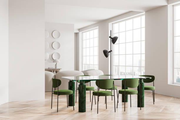 istock White dining room corner with green chairs 2108977039