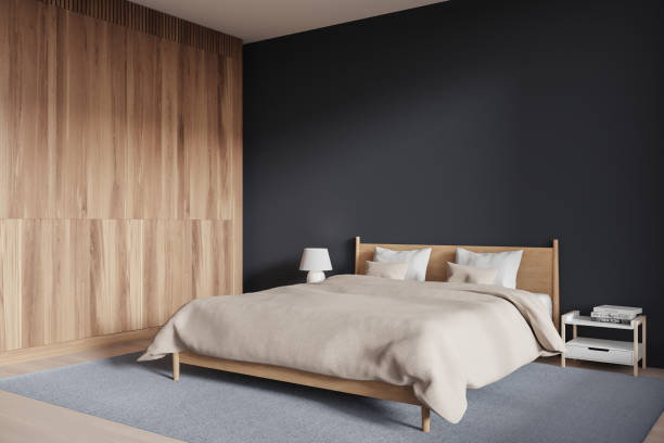 istock Stylish hotel bedroom interior with bed, nightstand and mock up wall 2108980804