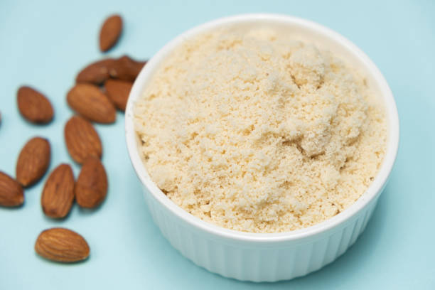 istock Almond flour and almonds on a light blue background 2108995712