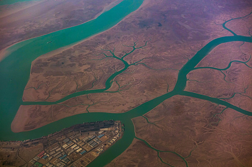 Drone shot of beautiful stream of water, River Meanders of Imam Khomeini Port in Iran