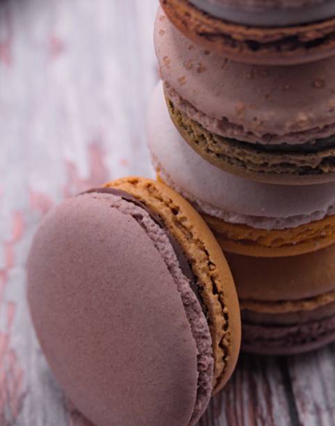 istock Set of macaroons on a wooden board 2109075023