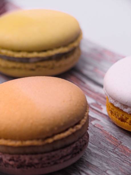 istock Set of macaroons on a wooden board 2109075025