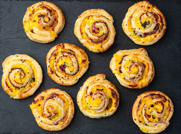 istock Homemade Puff pastry pinweel ( rolls ) Mini pizza 2109194657