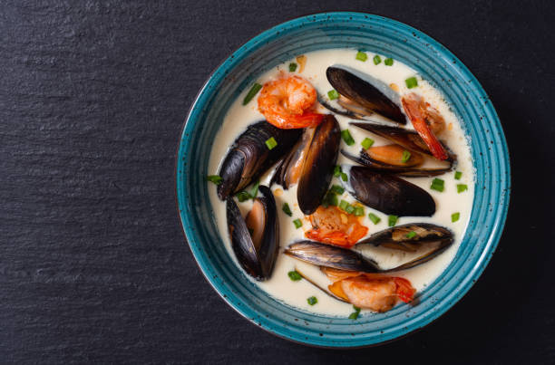 istock Cream soup with mussels 2109195235