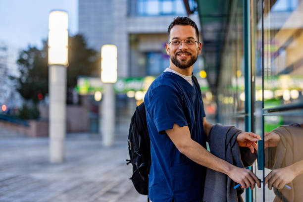 istock Male nurse arriving home from work 2109279441