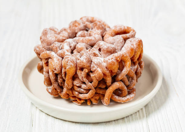istock tippaleipa, finnish may day funnel cakes on plate 2109279953