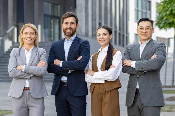 istock Confident business team standing outside office building 2109282655