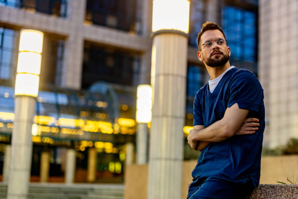 istock Emotionally and physically exhausted male nurse 2109282660