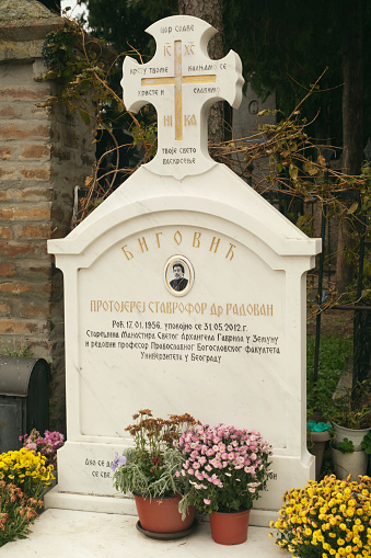 Belgrade, Serbia - December 3, 2023: The tombstone of a revered figure at the Church of the Holy Great Martyr Dimitrije Solunski