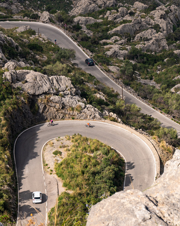 The famous Sa Calobra road in Mallorca, Spain, a favorite place for all cyclists. Lonely cyclists and cars