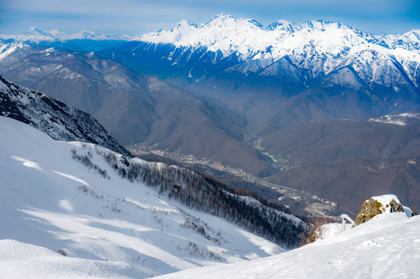 istock peaks of snow-capped mountains in winter 2109298466