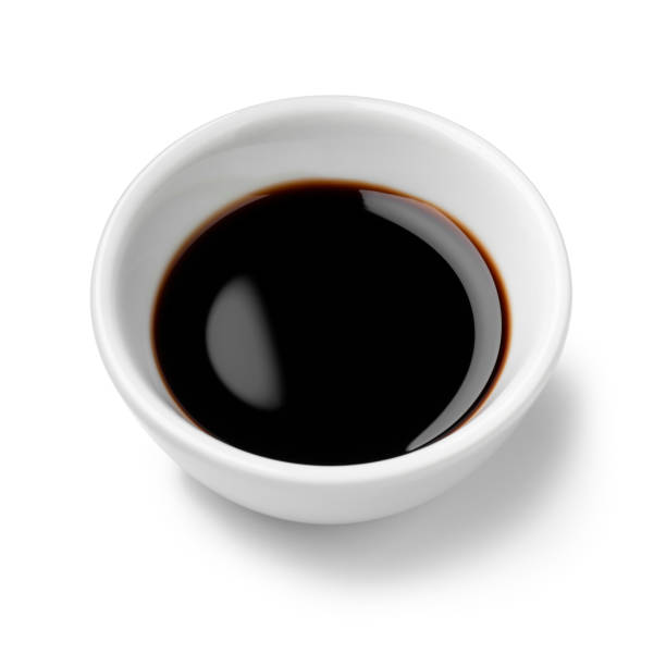 istock Single white bowl with Balsamic vinegar, aceto balsamico, on white background close up 2109332401