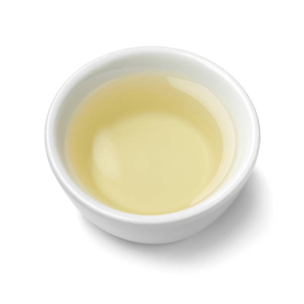 istock Single white bowl with natural vinegar on white background close up 2109332934