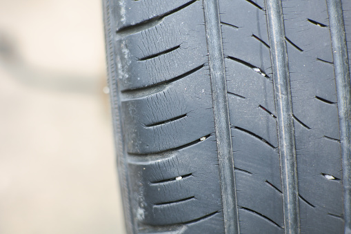 Dangerous tires that are deteriorated and have cracks and should be replaced
