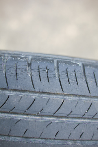 Dangerous tires that are deteriorated and have cracks and should be replaced