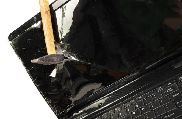 istock Old broken laptop isolated on white background, broken with hammer 2109346364