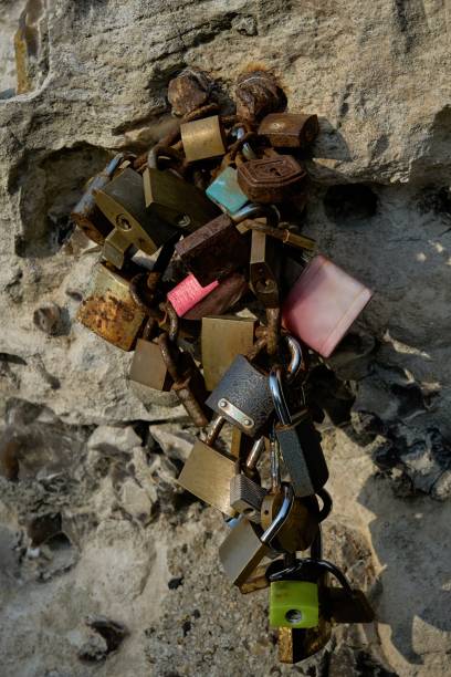 istock Love locks on the limestone cliffs of Etretat 2109416143