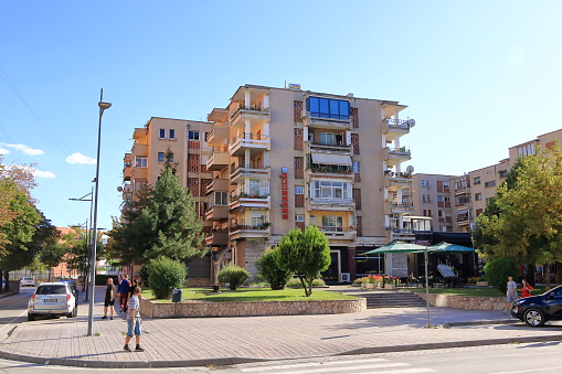 September 13 2023 - Korca in Albania: impressions of the modern part of the city, people live their every day life