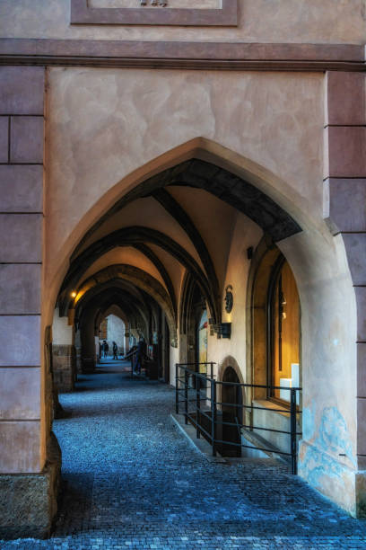 Prague, Czech Republic, May 12, 2024 : Tunnel passage under an old house on the Tomashska Street in historical part of the Prague in the Czech Republic
