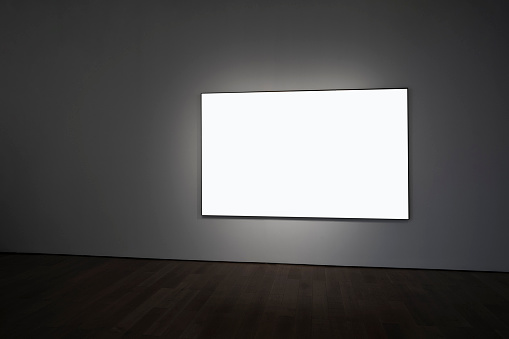 A blank picture frame on the indoor wall