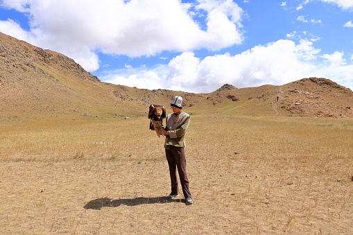 August 27 2023 - Bokonbayevo, Issyk Kul Province in Kyrgyzstan: Kyrgyz Eagle Hunters demonstrate a eagle hunt