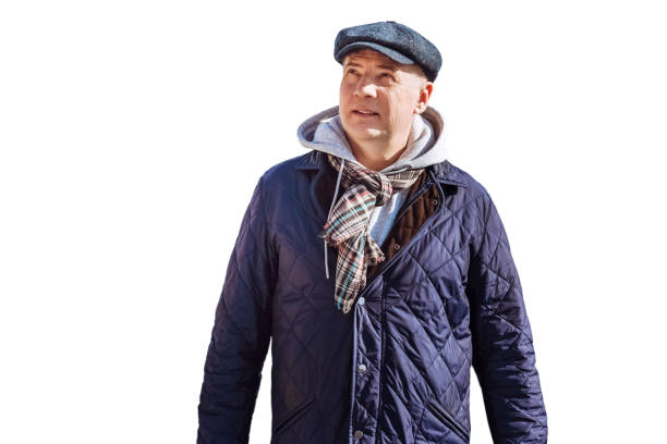 istock Man in down jacket, cap and scarf isolated 2109475196