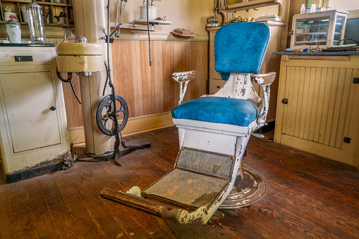 vintage dentist office with chair and drill