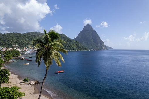 Aerial  of Gros Piton and Petit Piton on St. Lucia from Soufriere Beach.  Shot on a DJI Drone Air 2s in the Caribbean on beautiful Saint Lucia island.