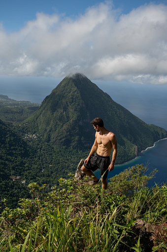 Person on top of Petit Piton of Gros Piton on St. Lucia.  Shot on a Sony mirrorless camera in the Caribbean on beautiful Saint Lucia island.