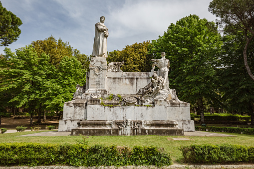 Monument to Francesco Petrarca on the lawn walk inside of Public park in Arezzo. Built in 1928, it is the largest marble complex dedicated to Francesco Petrarca