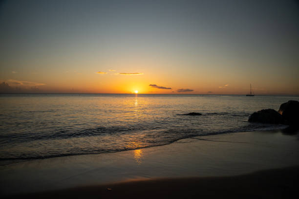 istock Beautiful colored sunset sky over Caribbean Sea from Saint Lucia beach. 2109546174