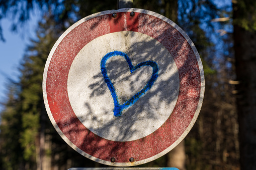 Love is forbidden - A prohibition sign with a heart