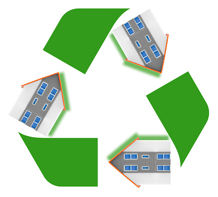 Recovery and recycling in construction industry and building activity - concept with recycling symbol and home models