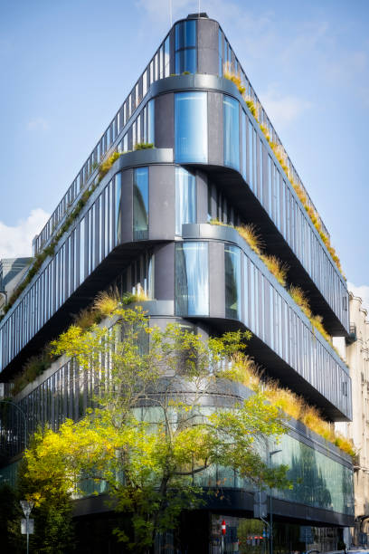 istock Apartment building with green plants on balconies 2109709555